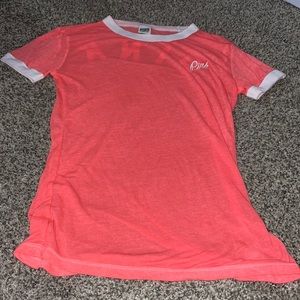 Slightly see through PINK T-shirt. Size XS.